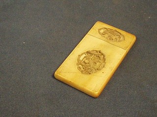 A 19th Century carved ivory card case 3 1/2"