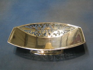 An Art Deco pierced silver boat shaped cake basket Birmingham 1934 with Jubilee hallmark, 14 ozs