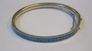 A silver and enamelled bangle