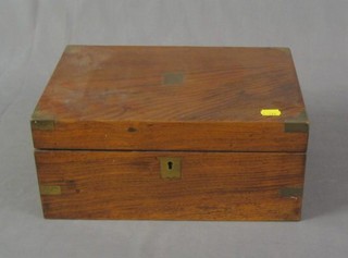A 19th Century walnut and brass banded writing slope with hinged lid 14"