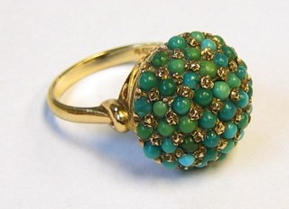 A gold ring set turquoise
