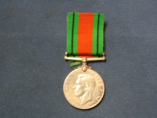 A WWII Defence medal, boxed