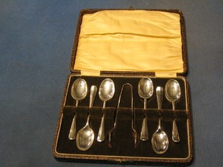 A set of 6 silver rat tail pattern coffee spoons, Sheffield 1924 complete with tongs, cased