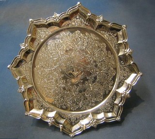 A Victorian shaped and engraved silver salver, Sheffield 1891 23 ozs