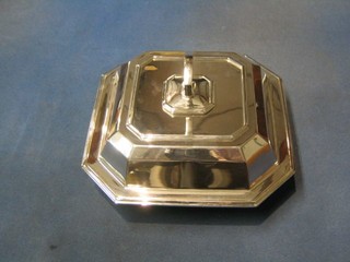 An octagonal silver plated entree dish and cover