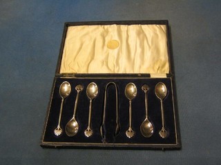 A set of 6 silver coffee spoons, with tongs Birmingham 1928, cased