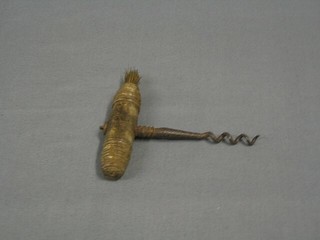 A 19th Century steel corkscrew with turned wooden handle and brush