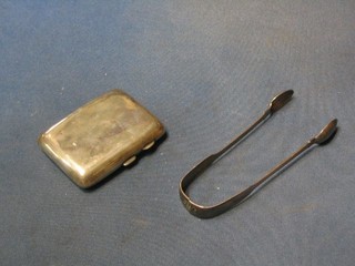 A silver cigarette case Birmingham 1918 and a pair of Georgian silver sugar tongs
