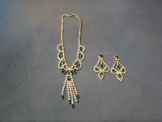 A diamonte necklace and matching earrings