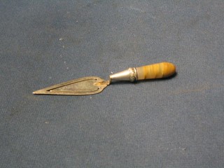 An Edwardian silver plated book mark in the form of a trowel with hardstone handle