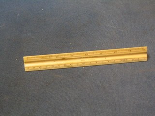 A 19th Century ivory pyramid shaped ruler, showing various measurements including chain etc by T W Winter of Newcastle Upon Tyne (slight chip to 1 end) contained in original cardboard box