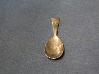 A silver caddy spoon, London 1959