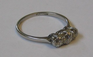 A lady's platinum dress ring set 3 diamonds