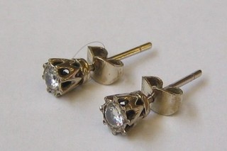 A pair of lady's diamond set ear studs