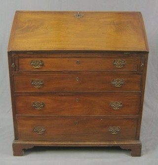 A Georgian mahogany bureau with well fitted interior above 4 long graduated drawers raised on bracket feet 36"