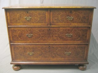 A Queen Anne style figured walnut chest of 2 short and 3 long drawers, the crossbanded top with satinwood stringing, raised on bun feet 44"
