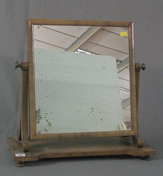A 19th Century rectangular plate dressing table mirror contained in a mahogany swing frame