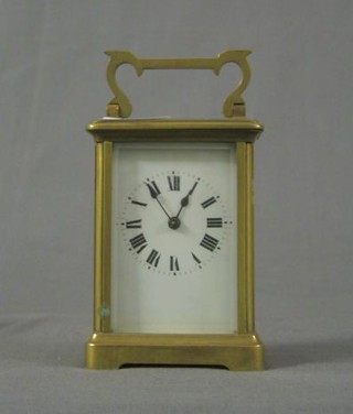 A 19th Century French 8 day carriage clock with enamelled dial and Roman numerals (replacement lever)