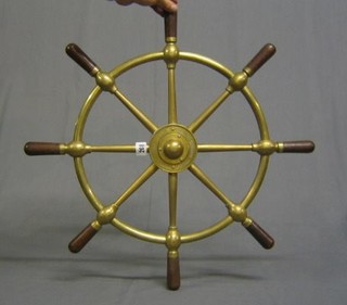 A brass ships wheel marked Brown Brothers & Co. Ltd, Rosebank Iron Works Edinburgh 25"