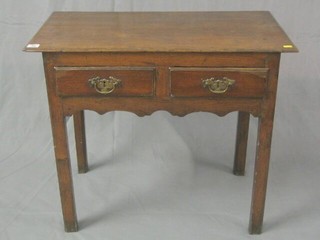 An 18th Century oak low bow/side table fitted 2 drawers and raised on square supports 31"