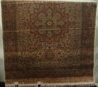 A fine quality contemporary cream ground and floral patterned Persian rug with central medallion 80" x 61"
