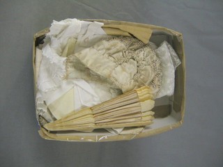 An ivory fan and various pairs of lady's kid skin gloves, a childs cap with pearl decoration
