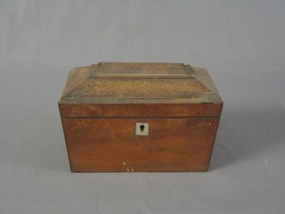 A 19th Century mahogany twin compartment tea caddy of sarcophagus form with hinged lid 8"