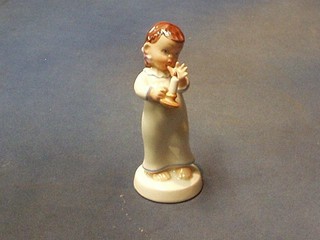 A Royal Dux figure of little girl in night gown and with chamber stick, the base with pink triangular Royal Dux mark, 6"