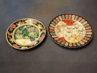A Canton famille vert porcelain plate decorated a peacock 8" and a circular Imari porcelain plate with lobed borders decorated a stork 10"