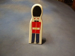 A Carltonware money box in the form of a standing Guardsman 9"