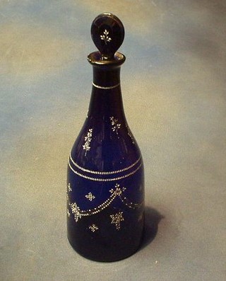 An 18th Century mallet shaped Bristol blue glass decanter and stopper with enamelled decoration 13"