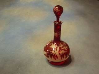 A 19th Century red Bohemian etched glass club shaped decanter and stopper decorated a hound chaising a stag 11"
