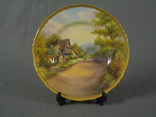 A Royal Worcester porcelain plated decorated Cropthorne, the base marked W1, 11"