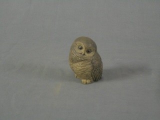 A Poole Pottery figure of a seated owl 4"