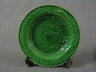 9 green leaf shaped plates (some damage)