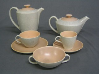 A 56 piece Poole Pottery pink and grey tea/dinner service comprising teapot, 2 hotwater jugs, cream jug, small cream jug, sauce boat, preserve jar, 5 twin handled bowls, 18 various cups, 25 various saucers, 6 white glazed plates and a saucer