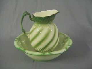 A green glazed pottery jug and bowl set
