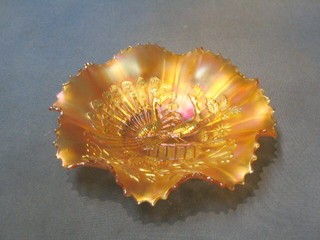 An orange Carnival glass dish decorated birds 8"