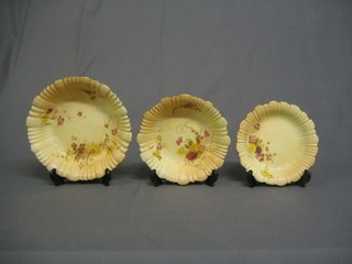 A Victorian Royal Worcester 8 piece dessert service viz: 2 - 9" circular bowls (chips to rims), 2 8" circular bowls, 4 7 1/2" circular plates (all chipped) decorated blush ivory ground and floral decoration, the bases with purple Royal Worcester mark and 2 dots, marked 1416