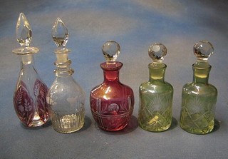 A pair of 19th Century green cut glass scent bottles 6" and 2 red overlay glass scent bottles and 1 other