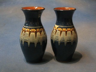 A pair of "Mocha ware" circular club shaped vases 7 1/2"
