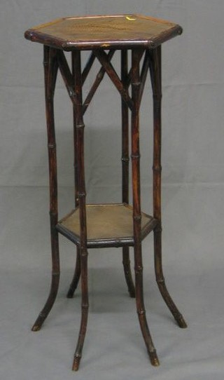 A 19th/20th Century octagonal bamboo 2 tier jardiniere stand, 15"