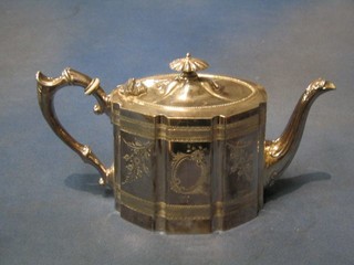 A Victorian engraved oval Britannia metal teapot