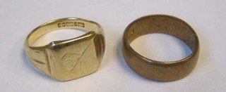 A 9ct gold signet ring and a gilt metal wedding band