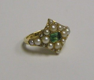 A lady's Victorian gold dress ring set a rectangular cut blue stone and demi-pearls