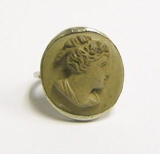 A lava carved cameo portrait ring set in a silver mount