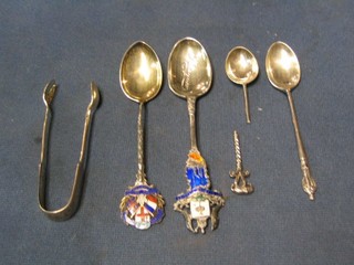 2 silver and enamelled souvenir teaspoons Glasgow and the Franco British Exhibition 1908, a silver apostle teaspoon, an Eastern spoon and a pair of silver sugar tongs