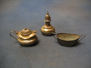 An oval silver mustard pot with demi-reeded decoration Chester 1922 and an oval silver twin handled salt with demi-reeded decoration Sheffield 1916 and a silver salt London 1904