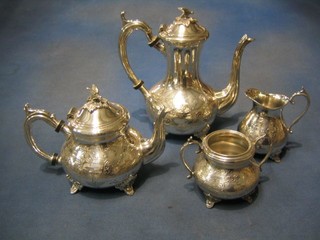 A silver plated engraved 4 piece tea and coffee service with coffee pot, teapot, twin handled sugar bowl and cream jug 