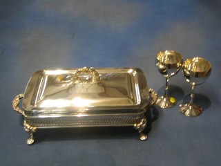 A rectangular pierced silver plated twin handled dish frame and 2 silver plated goblets